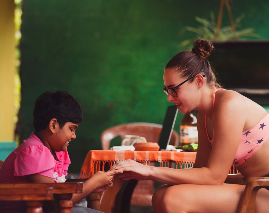 Great TEFL teacher talking to student