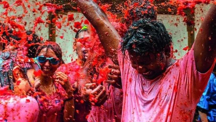 people at la tomatina festival - tefl in spain